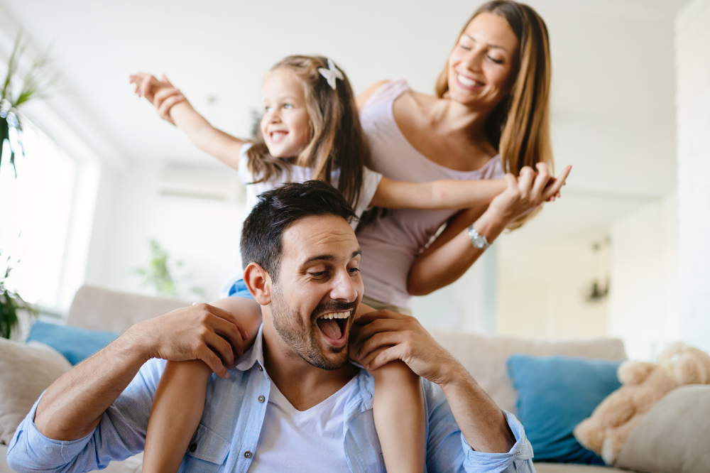 Mum, dad and daughter in a strong, healthy relationship.