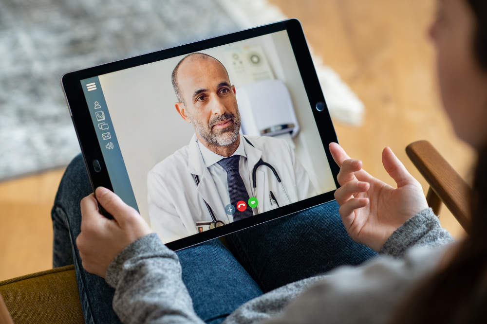 Online doctor via laptop.