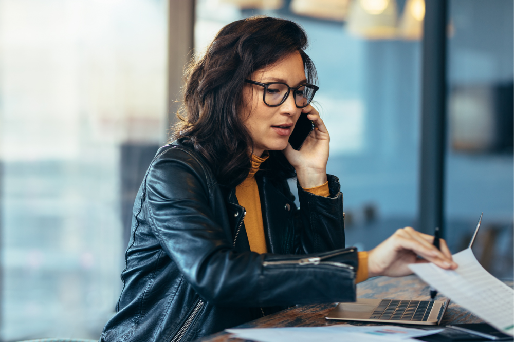 woman on phone for work related contact.